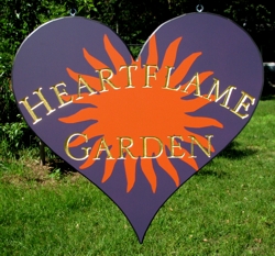 A very unique heart shaped sign gold leaf and purple background